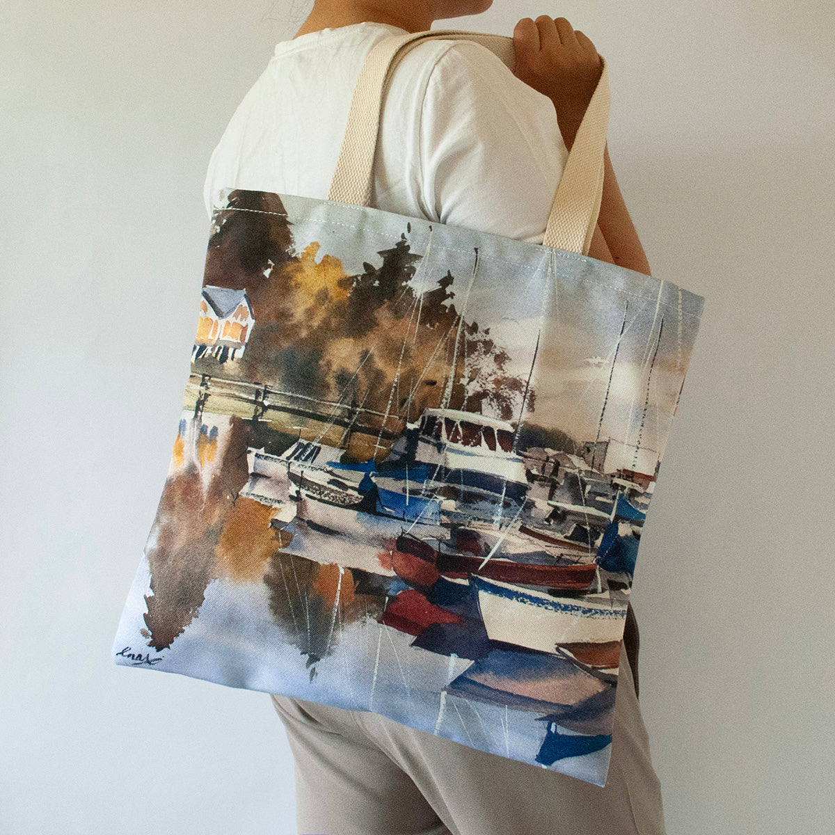 Large canvas tote with the artwork "Winslow Wharf in the fall"